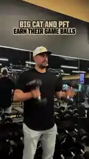 In a high-energy segment from the New Orleans Saints' training facility, players Big Cat and PFT push through an intense workout session. The footage captures their exhaustion during grueling exercises before they are rewarded with game balls for their effort. The scene transitions to them celebrating on the indoor practice field, culminating in a successful field goal attempt. by @saints with Original Sound by saints