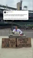 A man in business attire sits at a desk with a laptop inside Petco Park, promoting the San Diego Padres' new 'Remote Work Wednesday' event. Starting June 10th, fans can purchase tickets to work remotely from the ballpark during games, complete with a $10 voucher for lunch. The promotional clip features on-screen text detailing the offer and ticket information. by @fossnap with Original Sound by fossnap