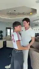 In this fun and lighthearted video, S E B A S 🧸 swaps his entire outfit with his brother, showcasing a playful 'fits with bro' moment. From a crop top and distressed jeans to a crisp polo shirt and chinos, they trade looks and pose together in a modern lounge setting. The energetic hip-hop track playing adds to the cool, trendy vibe of their style swap. by @twinksebass with Original Sound by Contains: Around Me - Noodah05