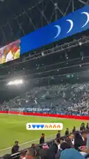 This video captures the electric atmosphere inside a packed football stadium during a live match. From the stands, fans dressed in blue wave flags and create a massive tifo display, showcasing their team spirit. The roar of the crowd is deafening, creating an immersive experience of passion and unity among supporters. by @abood114 with Original Sound by abood114