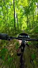 Experience the thrill of mountain biking through lush green forests and scenic trails. This first-person perspective journey captures the essence of outdoor adventure, showcasing the natural beauty of forest paths and open countryside. The ride transitions from dense woodland to a peaceful lakeside, offering a diverse range of terrains and landscapes. Perfect for anyone interested in cycling, nature exploration, or looking for inspiration for their next outdoor activity. by @vepace with Original Sound by vepace