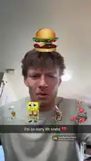 Watch Dylan Terryberry participate in a fun SpongeBob SquarePants-themed social media challenge. The filter places characters like SpongeBob, Patrick, Squidward, and Mr. Krabs around him while he attempts to keep a burger balanced on his head. As the challenge progresses, the filter changes, and he ultimately fails, triggering a 'YOU LOSE' graphic. This lighthearted and entertaining clip captures a moment of playful competition. by @datloading with Campfire Song Song by Spongebob Squarepants