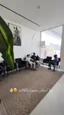 This video offers a behind-the-scenes look at the waiting area of 'Mughassalat Arbaa Qatir' (Four Drops Car Wash) in Qatar. Viewers see a stylish, modern lounge where customers relax before their car wash service, featuring comfortable seating, contemporary art, and large windows overlooking the facility. The scene captures the professional and upscale atmosphere of the business. by @wash.4drops with original sound