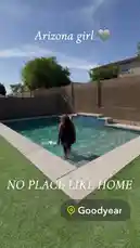 A person walks into a backyard swimming pool and jumps in, creating a big splash. The scene is set on a sunny day with a clear blue sky. by @seriouslyfd with Original Sound by seriouslyfd