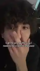 In a close-up, emotionally charged moment, Evan looks directly into the camera with his hand partially covering his face. Overlaid text reads, 'Call me an egg the way I need to be cracked and used.' This poignant visual is accompanied by a voiceover stating the same phrase, creating a powerful and introspective short-form content piece. by @evanjakeof with Original Sound by evanjakeof