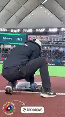 A grounds crew member meticulously prepares a base for the MLB World Baseball Classic at the Tokyo Dome. The video provides a close-up view of the preparation process, highlighting the event branding and the professional setup of the baseball field. by @mlb with Original Sound by mlb