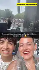 A behind-the-scenes look at the Sunday 1994 ACL festival, featuring two people enjoying the music and weather from the side stage. They are seen laughing and smiling while wearing ponchos, capturing the fun atmosphere despite the rain. by @snapcreators with Original Sound by snapcreators