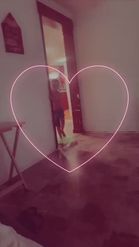 Preview for a Spotlight video that uses the Neon Pink Heart  Lens