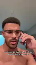 In this humorous social media clip, creator Jeremiah Brown pretends to call the San Antonio Spurs' front office to trade star player De'Aaron Fox. The shirtless man, wearing glasses, acts out the scenario with comedic frustration, delivering a punchline about customer service. This short-form content leverages sports fandom and celebrity parody for entertainment. by @findjeremiah with Original Sound by findjeremiah