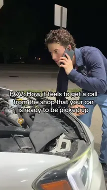 A young man stands next to his car at night with the hood open, talking on the phone. He looks relieved as he receives the call that his vehicle is ready for pickup after repairs. This relatable moment captures the satisfaction of getting your car back on the road. by @horsepwrhills with horsepwrhills by Original Sound