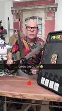 In this action-packed clip, THE MAGIC CRASHER faces off against a classic game of chance. He must decide whether to 'OPEN' or 'CUT' a prize pack, using giant scissors to make his choice. Will he get lucky? Watch as he makes his decision, cuts open the pack, and reveals the contents, all while asking viewers to subscribe. It's a perfect blend of suspense, magic, and audience interaction. by @themagiccrasher with Original Sound by themagiccrasher