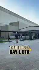 A behind-the-scenes look at quarterback Tyler Shough's first day at the New Orleans Saints' Organized Team Activities (OTA). The video captures him arriving on-site, holding a coffee cup, and walking through the facility with a team staff member. by @saints with Original Sound by saints