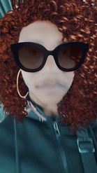 Preview for a Spotlight video that uses the Glasses & Curls Lens