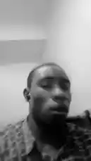 In this black-and-white, first-person perspective video, Zenith Aurelius appears in a contemplative state. The shaky camera work creates an intimate, raw feel, focusing on his expression and upper body as he sits indoors. This personal snapshot captures a quiet, introspective moment. by @zenith_aurel with Ori e by Contains: Ori E - Trench Boy.