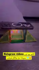 Watch as a smartphone is wirelessly charged using a custom-built, illuminated stand made from colorful translucent blocks. This clever setup demonstrates a unique way to use MagSafe technology while creating a vibrant, ambient glow underneath the phone. by @moneeragh with original sound