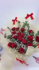 Watch a step-by-step process of crafting a beautiful red rose bouquet. This tutorial shows how to combine vibrant red roses with delicate baby's breath and fresh eucalyptus, then elegantly wrap them in cream-colored paper and tie with charming red ribbons. Perfect for learning floral arrangement techniques. by @dsunmusic with Original Sound by dsunmusic