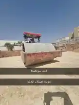 Watch a powerful road roller from ALEMAR CONCEPT compacting a dirt surface under a clear blue sky. This real-time, ground-level view captures the machine's operation, showcasing its red-painted drum and operator cabin. Ideal for construction enthusiasts and professionals seeking insights into heavy equipment functionality. by @alemarconcept with original sound