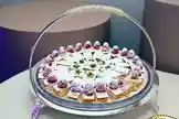 Watch as a beautifully arranged raspberry dessert platter is showcased in detail. Each bite-sized treat is elegantly garnished with fresh raspberries and powdered sugar, perfect for impressing guests at your next gathering. This visually appealing presentation offers inspiration for easy yet impressive party desserts. by @blue11sweet with original sound