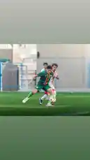 Watch the thrilling action unfold as players from Saudi Arabia's Al-Rawda Club battle fiercely on the pitch. This clip captures a key moment during a competitive soccer match, showcasing skillful ball control and athletic determination under pressure. by @alrawdahclub with original sound