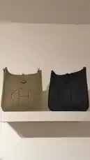 This video provides a side-by-side comparison of two classic Hermès handbags, showcasing their design details, textures, and color options. Viewers can observe the craftsmanship and subtle differences between the models, making it ideal for those interested in luxury fashion and bag identification. by @lussowatches with original sound