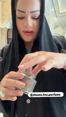 A woman in traditional attire demonstrates how to use agarwood incense from Shams Line Perfume. She opens a jar of agarwood, lights it in a wooden incense burner, and shows the resulting smoke. The setting appears to be a luxurious interior. by @shamslinep with shamslinep by Original Sound