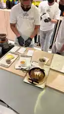 Watch as baristas at Sequence Coffee prepare a unique coffee-based dessert using fresh ingredients and professional techniques. This behind-the-scenes look showcases their skill in crafting an innovative treat, blending coffee culture with culinary artistry. by @sequence-coffee with original sound