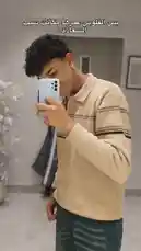This short-form video demonstrates a popular social media trend. It begins with a young man taking a mirror selfie, showcasing his outfit and curly hair. The scene then cuts to a classic internet meme of a happy baby, humorously implying that the 'glow-up' moment is what makes him happy. This transition from a stylish self-presentation to a relatable, joyful reaction is a common format for engagement-driven content. by @sofaa_66 with sofaa_66 by Original Sound