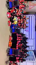 Watch the فريق رسالة سلام التطوعي (Team Salam Message Volunteer Group) in action at an airport in the UAE. This dynamic, vertically-shot video shows the team posing together in their red and black uniforms, ready to assist travelers. They are equipped with luggage trolleys and medical bags, highlighting their role in providing support services. The scene captures the professionalism and unity of this volunteer crew, showcasing their commitment to service. by @peace.message with original sound