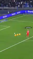 A tense penalty kick unfolds in a Serie A football match. The goalkeeper, dressed in red, dives to his left and successfully saves the shot, sending the ball away from the net. The crowd erupts in reaction to the dramatic save. by @seriea with Original Sound by seriea