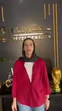 In a lively office setting at Ouda Developments, employees are asked to predict the outcome of an upcoming soccer match. A woman in a red shirt approaches various colleagues, who enthusiastically share their predictions for the game between Egypt and another team. The atmosphere is casual and engaging, capturing the excitement and camaraderie among the staff. by @ouda_dev with Original Sound by ouda_dev