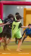 This high-energy, slow-motion sequence captures young soccer players intensely training indoors. Dressed in black jerseys and bright green bibs, they execute drills near a goalpost under the guidance of their coaches. The footage highlights teamwork, agility, and focus, showcasing the dedication behind youth sports development. by @playerassoc with original sound