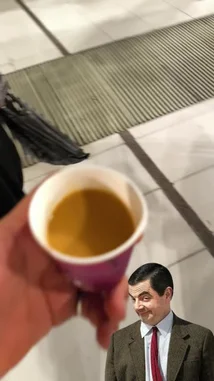 This short clip follows a humorous journey from a simple cup of tea to the bustling, illuminated streets of Mecca at night. A digital overlay of Mr. Bean adds a comedic twist to the real-world scenes of the Grand Mosque and its surrounding cityscape. by @om-5p with Original Sound by om-5p