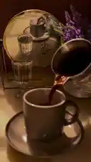 A serene morning coffee pour, captured in a beautifully styled setting with soft lighting and elegant tableware. This peaceful moment is accompanied by a heartfelt Arabic voiceover wishing listeners a fresh start, new hopes, and lasting happiness, creating an atmosphere of calm and positive intention. by @soldere.ledyafa with Original Sound by soldere.ledyafa