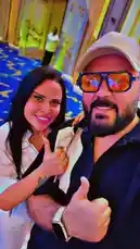 In this exclusive behind-the-scenes look, renowned DJ SIF shares a warm moment with a fan in a luxurious setting. The scene captures a genuine connection as they pose together, showcasing stylish attire and a vibrant atmosphere. This candid interaction highlights the personal side of celebrity life and the joy of fan engagement. by @djsefo with original sound