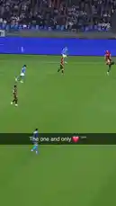 An intense moment from a Serie A football match, showcasing a dramatic tackle between players from opposing teams. The player in the red and black striped jersey attempts to control the ball but is brought down by a defender in light blue. The crowd in the stadium watches closely as the play unfolds under bright lights. by @seriea with Original Sound by seriea