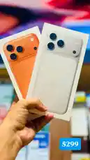 A hand holds two iPhone boxes—one orange, one white—showing off their camera designs. A blue price tag reading '5299' appears on screen, suggesting a promotional offer. This quick reveal hints at a tech deal or unboxing moment, perfect for curious shoppers. by @hyperalwafa with original sound