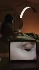 This video provides a behind-the-scenes look at a skincare treatment at Rivive, a beauty center located in the Hitin District. It opens with a close-up of a client's eye during a procedure, guided by a technician using a tablet. The video then transitions to showcase the Rivive brand identity, highlighting its modern aesthetic and commitment to 'essence of beauty.' This glimpse into a professional beauty clinic experience is perfect for anyone interested in skincare, wellness, and high-end beauty services. by @rivive.sa with Original Sound by Contains: Woop Baby (Extended Version) - Letherette