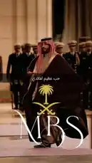 Watch the official address by MBS during Saudi Arabia's National Day parade. This powerful moment captures the Crown Prince reviewing troops and delivering a speech in traditional attire. The iconic Saudi flag emblem is overlaid throughout the footage. by @alemarconcept with original sound