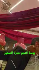 In a vibrant wedding celebration, Mohamed Fouad shares a touching moment with his brother. The scene captures their deep bond as they embrace and celebrate together amidst festive decorations. by @mo.fouadziko with Original Sound by mo.fouadziko