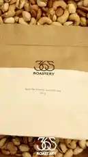 This video showcases the premium nut mix from 365 Roastery. It begins with a close-up of their branded packaging, then transitions into a mouth-watering display of roasted cashews, pistachios, and almonds being poured and mixed. The rich textures and golden-brown colors highlight the quality of these roasted nuts, making it an enticing visual for anyone interested in gourmet snacks. by @roastery365 with Original Sound by Snapchatter