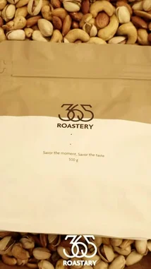 This video showcases the premium nut mix from 365 Roastery. It begins with a close-up of their branded packaging, then transitions into a mouth-watering display of roasted cashews, pistachios, and almonds being poured and mixed. The rich textures and golden-brown colors highlight the quality of these roasted nuts, making it an enticing visual for anyone interested in gourmet snacks. by @roastery365 with Original Sound by Snapchatter
