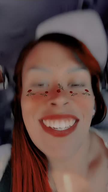 Preview for a Spotlight video that uses the Red Flowery Freckles Lens