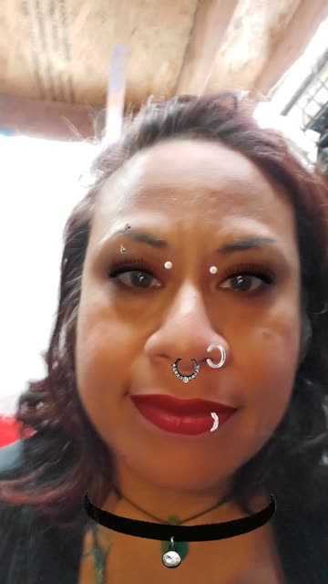 Preview for a Spotlight video that uses the Face Piercings Lens