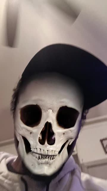 Preview for a Spotlight video that uses the Flaming Skull Lens