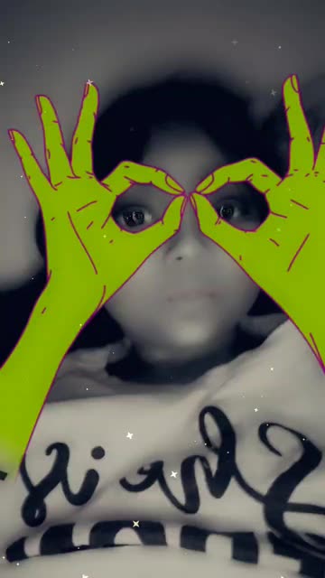 Preview for a Spotlight video that uses the Colorful Hands Lens