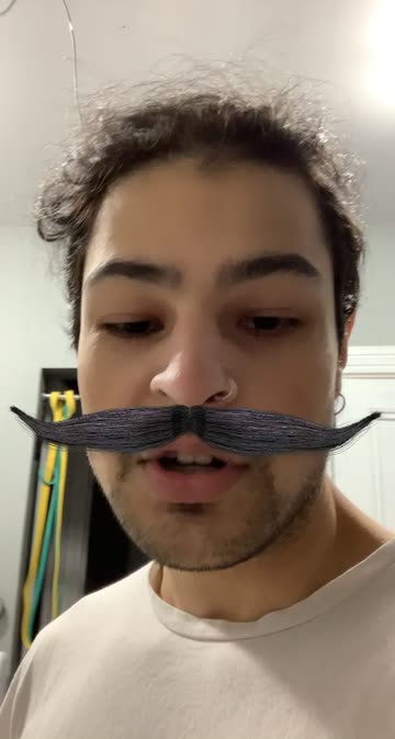 Preview for a Spotlight video that uses the Epic Mustache Lens