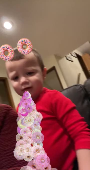 Preview for a Spotlight video that uses the Love Donuts Lens