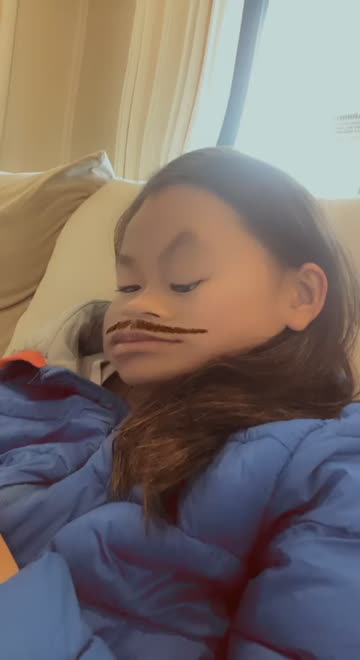 Preview for a Spotlight video that uses the Funny Moustache Lens