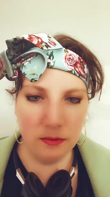 Preview for a Spotlight video that uses the Floral Headband Lens