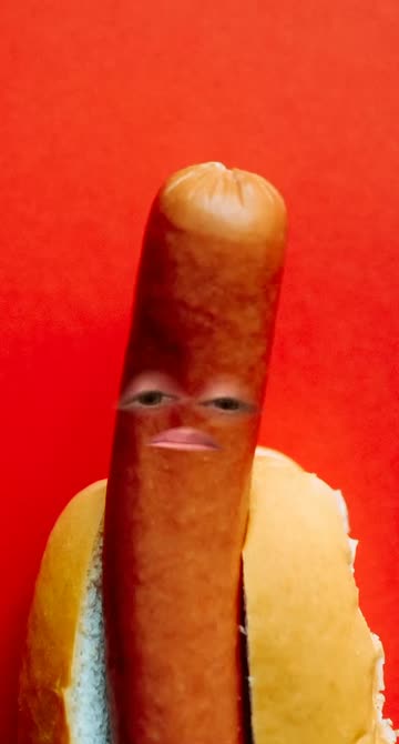 Preview for a Spotlight video that uses the Hotdog face Lens
